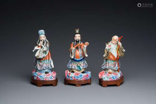 Three Chinese famille rose sculptures of star gods, seal mar...