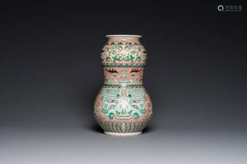 A Chinese famille verte vase with taotie masks, Xuande mark,...