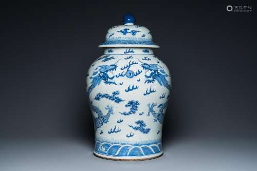 A large Chinese blue and white 'dragons' vase and cover, 19t...