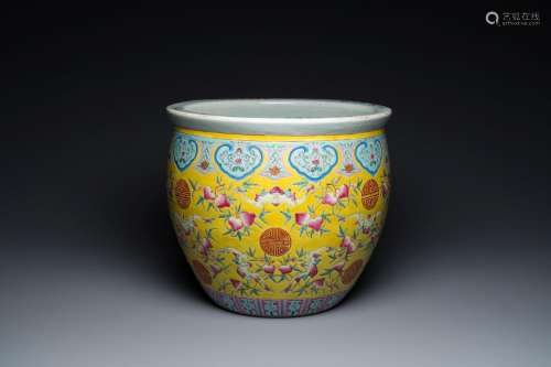 A Chinese famille rose yellow-ground fish bowl with bats and...