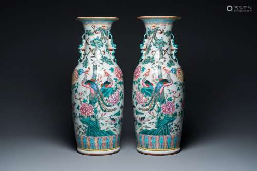 A pair of Chinese famille rose 'phoenixes and pheasants' vas...