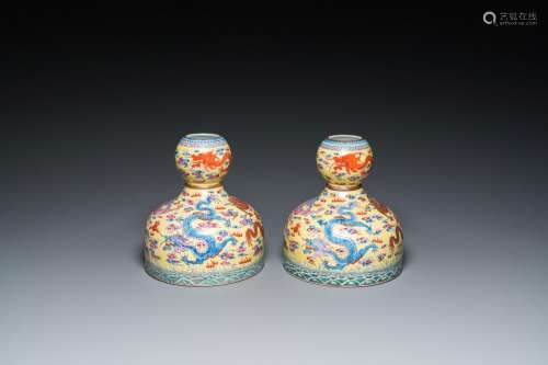 A pair of Chinese famille rose yellow-ground 'dragon' vases,...