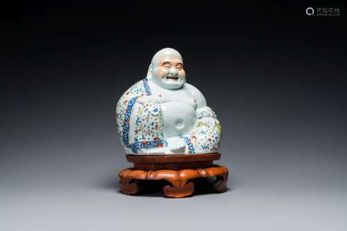 A Chinese famille rose Buddha figure on wooden stand, Zhu Ma...