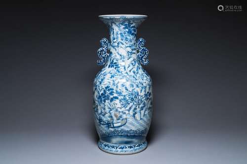 A large Chinese blue, white and copper-red vase with a mount...