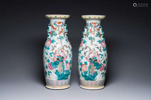 A pair of Chinese famille rose vases with peacocks and phoen...