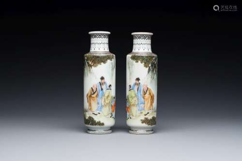 A pair of Chinese famille rose rouleau vases, signed Xiong X...