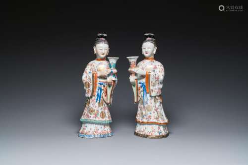 A pair of large Chinese famille rose candle holders in the s...
