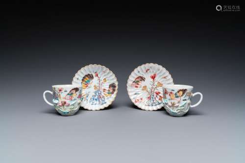 A pair of Chinese famille rose relief-decorated cups and sau...