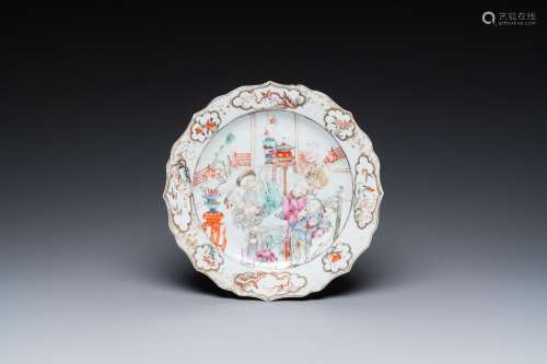 A Chinese famille rose 'mandarin tea drinkers' plate, Qianlo...