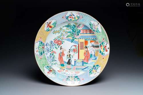 A large Chinese famille rose dish with a temple scene and ei...