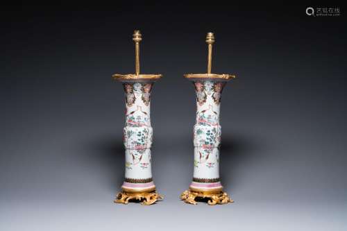 A pair of Chinese famille rose vases with fine gilt bronze l...