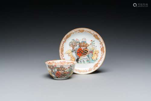 A Chinese Dutch market famille rose cup and saucer with the ...