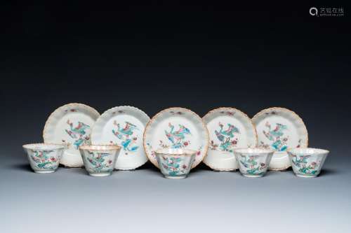 Five Chinese famille rose cups and saucers with a heron eati...