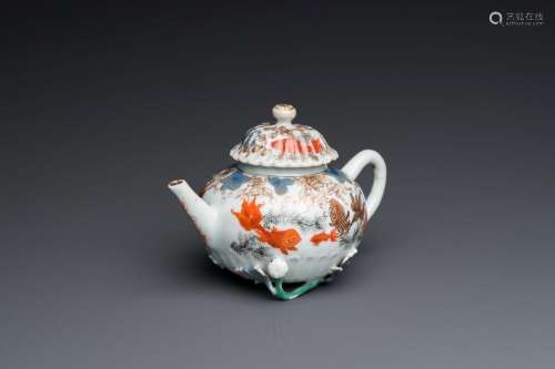 A Chinese iron-red and gilt-decorated 'carps' teapot and cov...