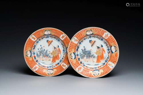 A pair of Chinese Imari-style plates with 'Parasol ladies' a...
