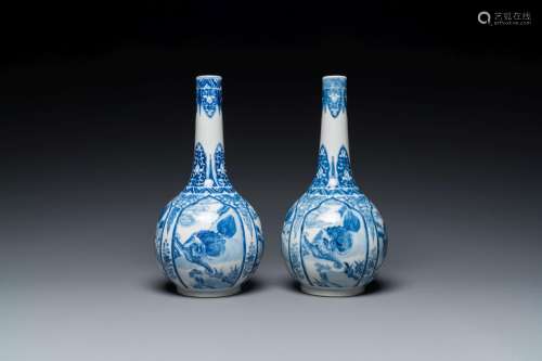 A pair of Chinese blue and white bottle vases with mythical ...