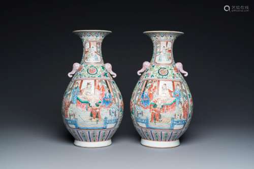 A pair of Chinese famille rose vases with elephant handles, ...