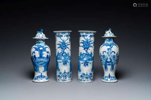 A Chinese blue and white garniture of five vases with ladies...