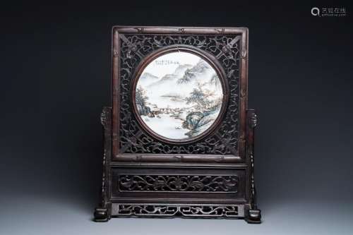 A Chinese wooden table screen with a qianjiang cai plaque, s...