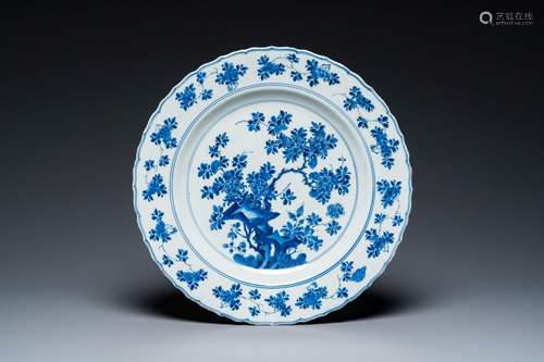 A Chinese blue and white dish with floral design, Kangxi mar...