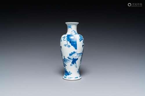 A Chinese blue and white 'two ladies and a boy' vase, Kangxi