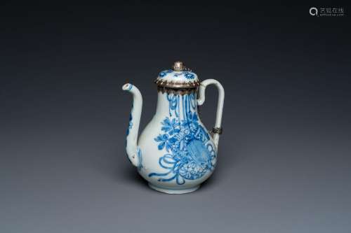 A Chinese blue and white teapot and cover with silver mounts...