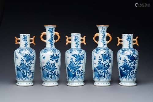 A Chinese blue and white garniture of five vases with floral...