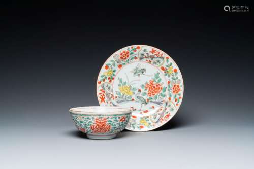 A Chinese famille verte 'cranes' plate and a 'peony scroll' ...