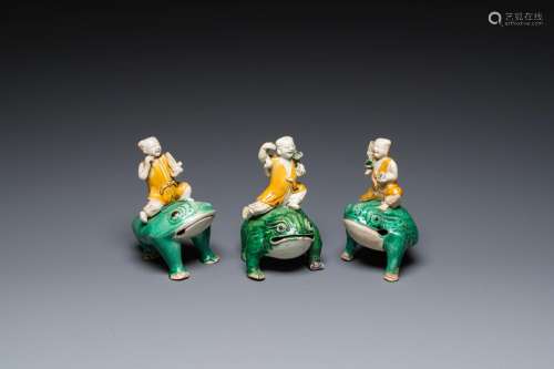 Three Chinese verte biscuit sculptures of Liu Hai on the thr...