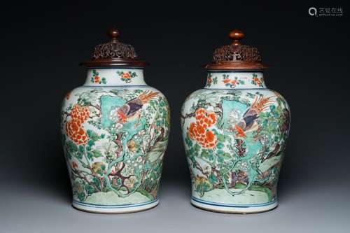 A pair of Chinese famille verte 'pheasant' vases with wooden...