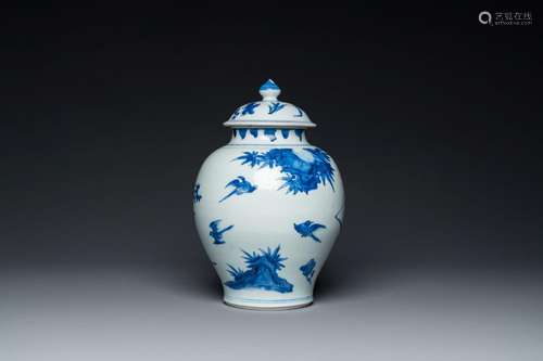 A Chinese blue and white covered vase with birds among bloss...