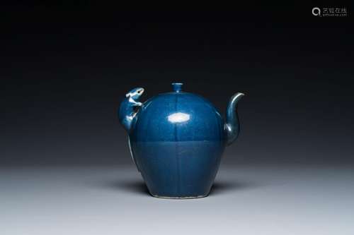 A Chinese blue-glazed teapot with a rat-shaped handle, Trans...