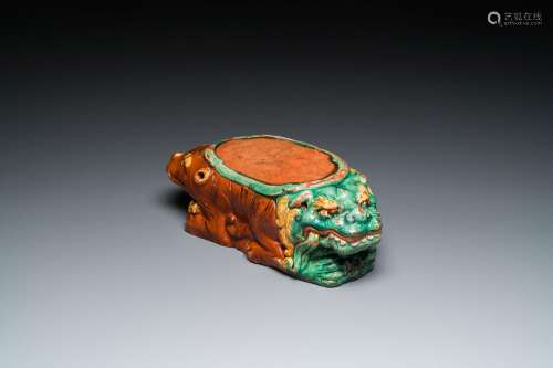 A Chinese sancai-glazed 'three lions' pillow or neck rest, M...