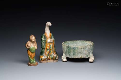 Two Chinese sancai-glazed figures and a green-glazed tripod ...