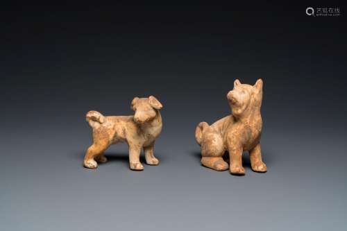 Two Chinese 'mingqi' painted pottery models of dogs, Han