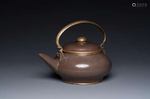 A Chinese polished Yixing stoneware teapot and cover for the...