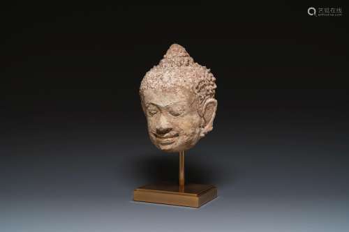A large Thai stucco head of Buddha, Haripunchai region, 13th...