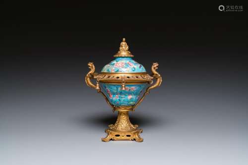 A Chinese Canton enamel bowl and cover with fine gilt bronze...