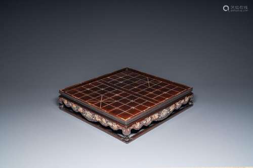 A Chinese mother-of-pearl-inlaid wooden Xiangqi chess board,...