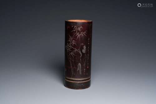 A Chinese bamboo brush pot with engraved inscription for the...