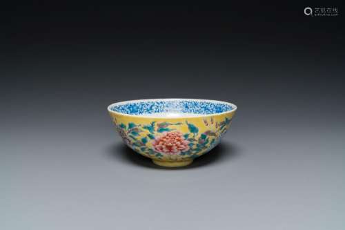 A Chinese famille rose yellow-ground bowl with floral design...