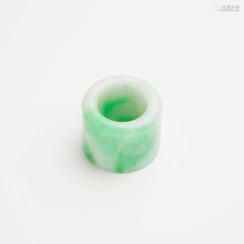 A Jadeite Archer's Ring, Qing Dynasty, 清 翡翠扳指, diameter...