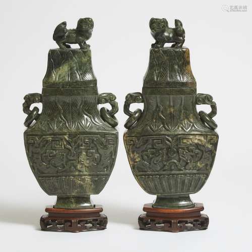 A Pair of Large Spinach Jade Vases and Covers, 19th/20th Cen...