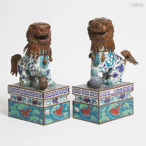 A Pair of Enameled Copper Buddhist Lions, Mid 20th Century, ...