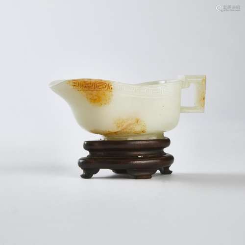 A Small White and Russet Jade Libation Cup, Ming Dynasty (13...