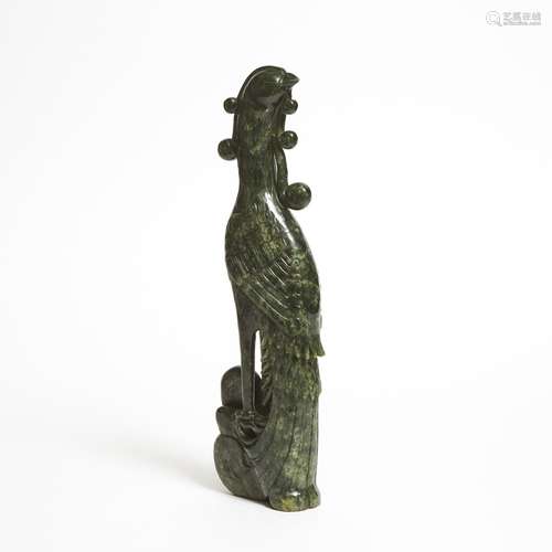 A Large Spinach Jade Carving of a Phoenix, 19th/20th Century...