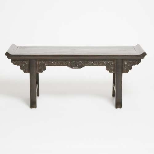 A Zitan Trestle-Leg Table-Form Display Stand, Qing Dynasty, ...
