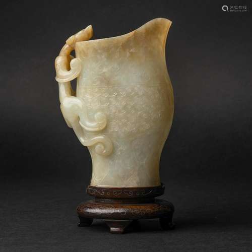 A Finely Carved White and Brownish-Yellow Russet Jade Rhyton...