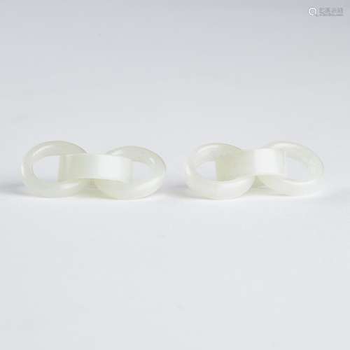 A Pair of White Jade 'Triple-Hoop' Earrings, Qing Dynasty, 清...