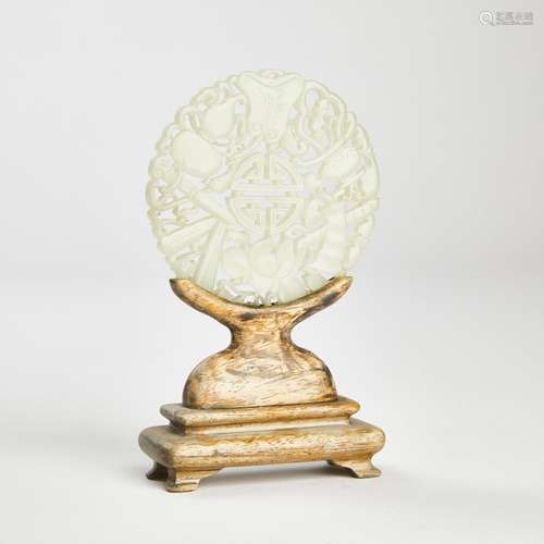 A White Jade Reticulated 'Eight Immortals' Circular Plaque, ...